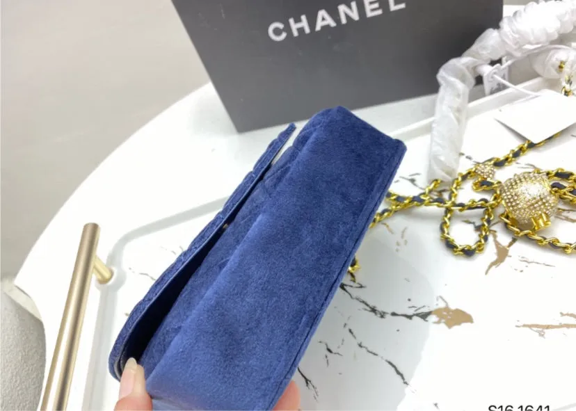 Blue suede Chanel woman handbag