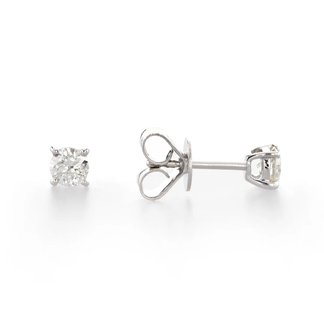 Solitaire Studs set in 18K White Gold