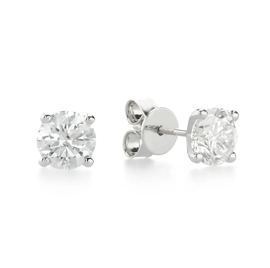 Solitaire Studs set in 18K White Gold